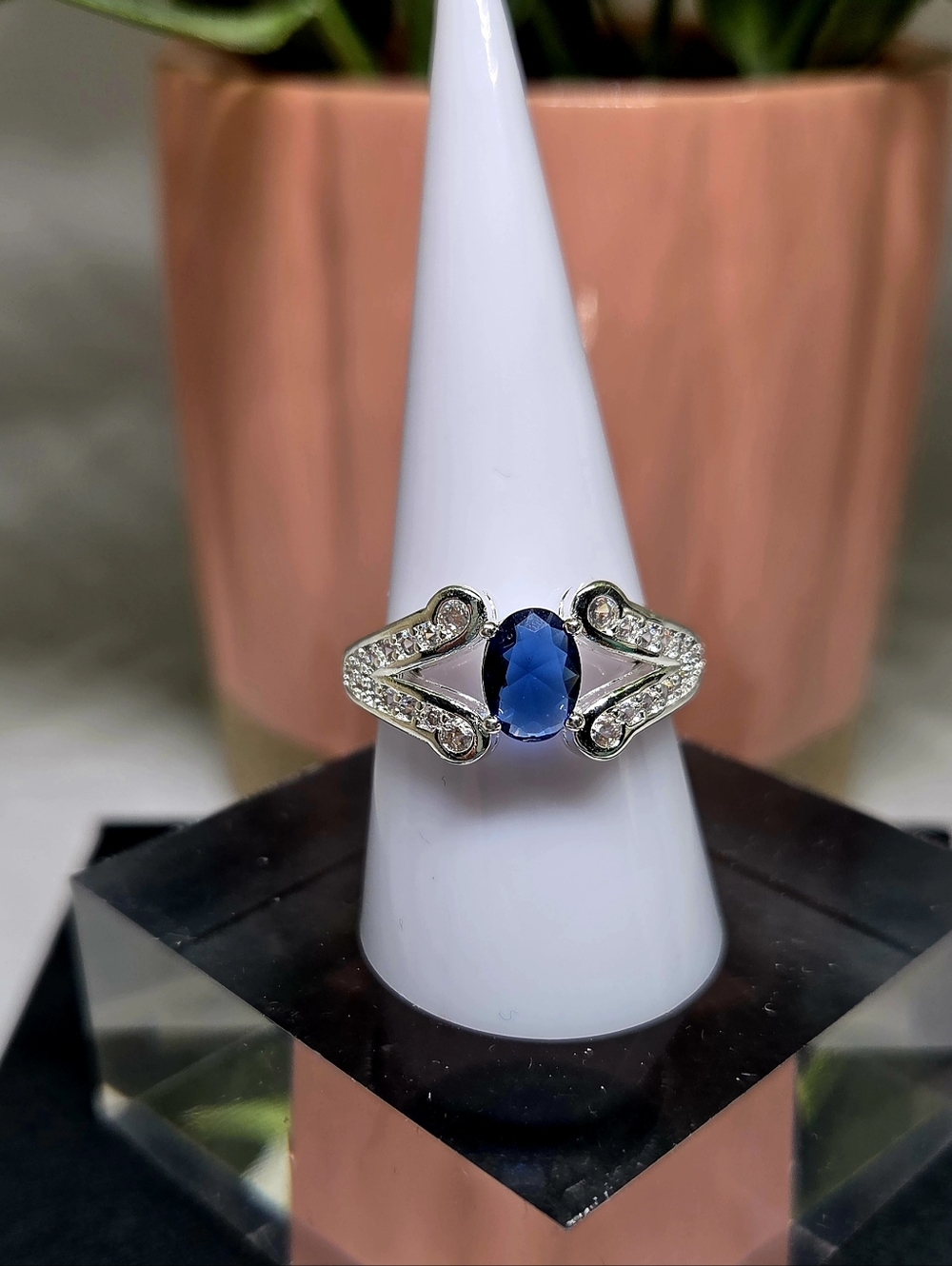 Classic Silver Ring with Blue Center Stone and Accented Crystals